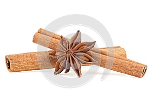 Cinnamon sticks and anise star isolated on white background. Spices. Macro