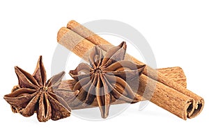 Cinnamon sticks and anise stars isolated on white background. Spices. Macro