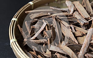 Cinnamon sticks in the basket, close up, macro