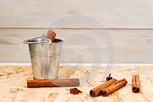 Cinnamon sticks in a bucket photo