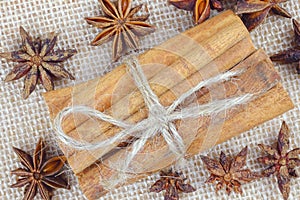 Cinnamon sticks on burlap. View from above.