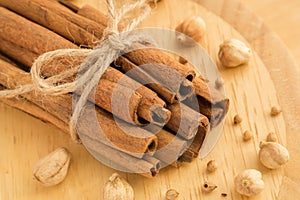 Cinnamon sticks, cardamon seeds and coriander seeds