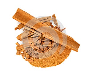 Cinnamon sticks and powder isolated on white background
