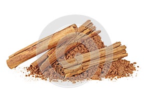Cinnamon sticks and powder, white background. Ceylon cinnamon