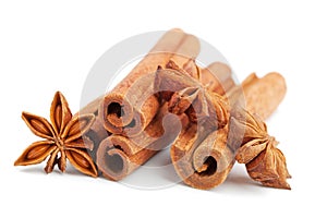 Cinnamon sticks and star anise isolated on white background. Christmas spices.