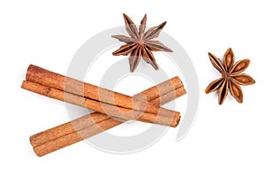 Cinnamon sticks and star anise isolated on white background. Top view