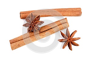 Cinnamon sticks and star anise isolated on white background. Top view