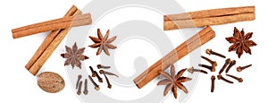 Cinnamon sticks with star anise, nutmeg and clove isolated on white background. Top view