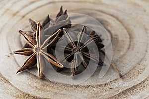 Cinnamon sticks and star anise spice  on a wooden background.