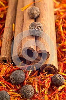 Cinnamone, peppercorn and saffron close-up
