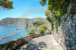 Cinque Terre: Hiking trail from Vernazza to Monterosso al Mare, hiking in early summer at Mediterranean landscape, Liguria Italy
