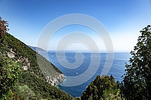 Cinque Terre National Park in Italy. Hiking among tree covered hills on Italian coast