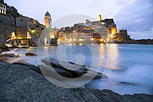 Cinque Terre town and harbor seascape after sunset, Vernazza, Liguria