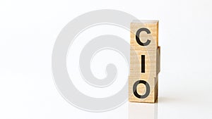 Cio - acronym from wooden blocks with letters, chief information officer, white background