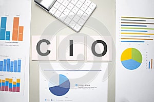 CIO business, search engine optimazion,Text on the sheets of paper, charts and white calculator
