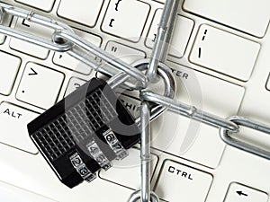 Cipher padlock on keyboard