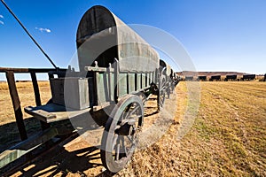 Circle of 64 replica Voortrekker wagons cast in bronze at Blood River Heritage Site, KwaZulu-Natal, South Africa