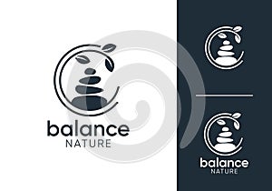 circle balancing stone with leaf tree logo design vector
