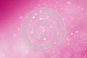 Circle bokeh blurred on pink background abstract