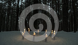 Circle of candles in dark winter forest