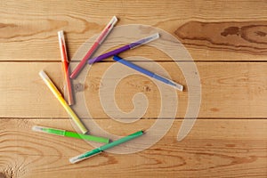 Circle from closed circle-shaped multi-colored felt-tip pens