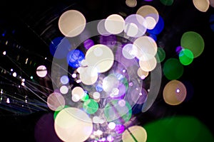 Circle colorful bokeh light celebrate at night, defocus light abstract background.