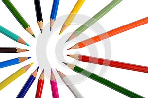 A circle of coloring crayons isolated