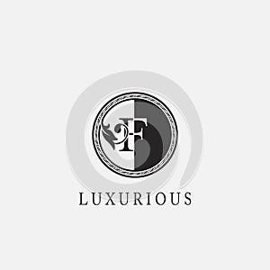 Circle F Letter Logo Icon. Classy Vintage Ornate Leaf Shape design on black and white color for business initial like fashion,