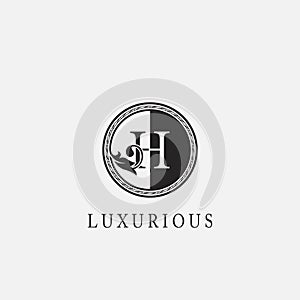 Circle H Letter Logo Icon. Classy Vintage Ornate Leaf Shape design on black and white color for business initial like fashion,