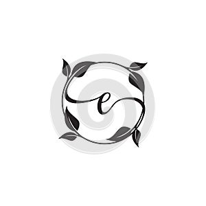 Circle leaf letter E nature logo design concept photo