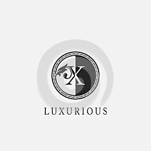 Circle X Letter Logo Icon. Classy Vintage Ornate Leaf Shape design on black and white color for business initial like fashion,