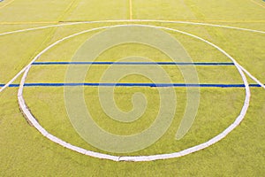 Circle in middle of playground. Empty outdoor handball court