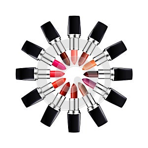 Circle of open tube of lipstick. Lipstick of different colors laid out in a circle. Isolated on white.