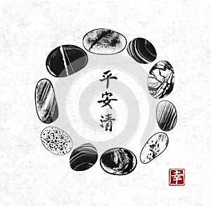 Circle of pebble stones on rice paper background. Traditional Japanese ink painting sumi-e. Contains hieroglyphs - peace