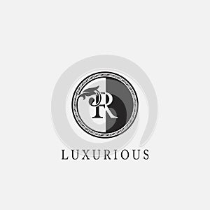 Circle R Letter Logo Icon. Classy Vintage Ornate Leaf Shape design on black and white color for business initial like fashion,