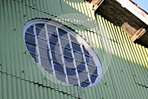 Circle shape of sun ray house on the zinc wall