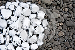 Circle of stones covered with foil