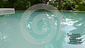 circle swimming pool in the garden