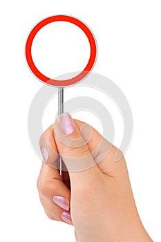 Circle traffic sign in hand