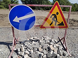 Circle and triangle warning road signs