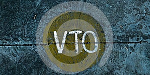 Circle with VTO (Volunteer Time off) written in the centeer on the concrete surface