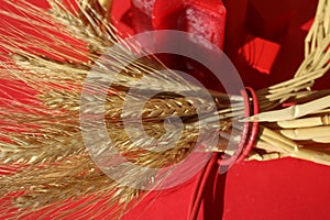 Circle wreath a bundle of wheat with star candle, two red paper hearts, valentine day, love and romance, prophecy