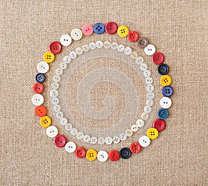 Circles of colorful sewing buttons