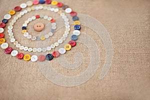 Circles of colorful sewing buttons