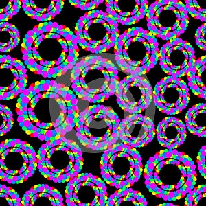 Circles composed of dots in psychedelic colors, multicolored uneven distributed shapes on black background.