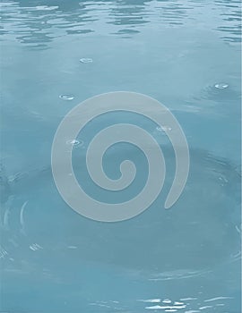 Circles From The Rain Drops On The Water In The Pool