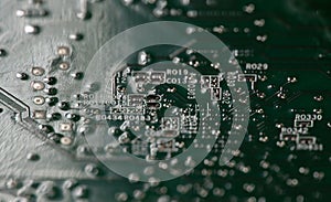 Circuit board with integrated electronics. Circuit board in hardware background. Circuit board for computing data. Circuit board