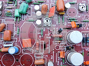 Circuit board with resistors and capacitors.