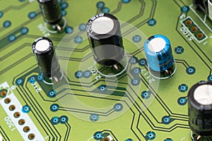 Circuit board with resistors microchips and electronic components background. Computer hardware technology. Integrated