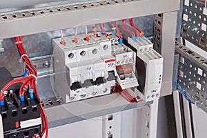 Circuit breakers, intermediate relay and phase control relay in the electrical Cabinet